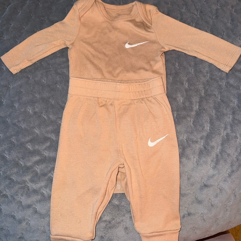 Nike Kids Bodysuit in Tan with White Logo